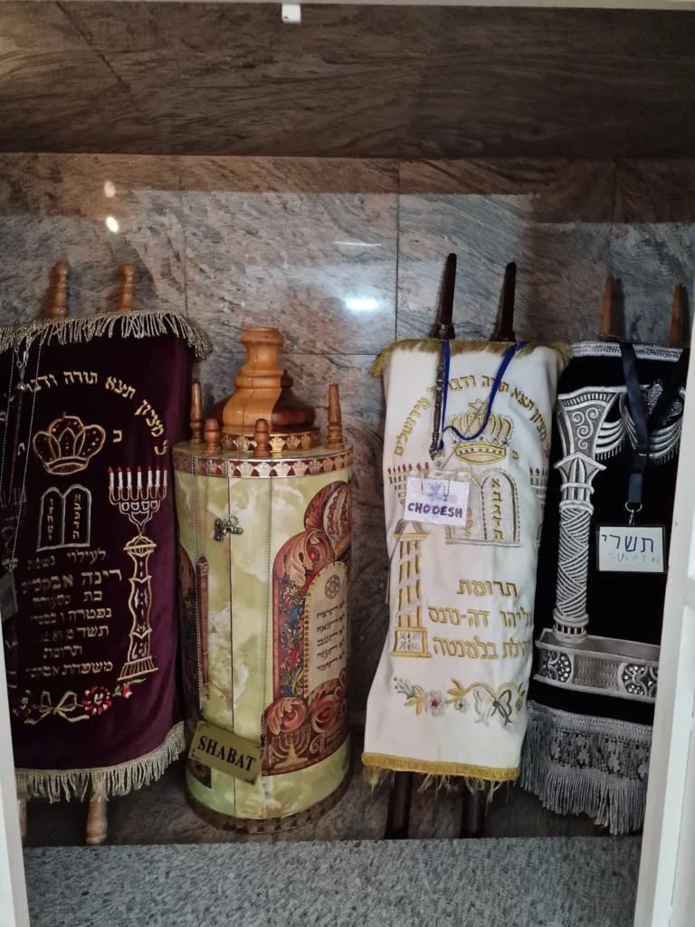 Four Torah scrolls inside the Aron Kodesh (Holy Ark)