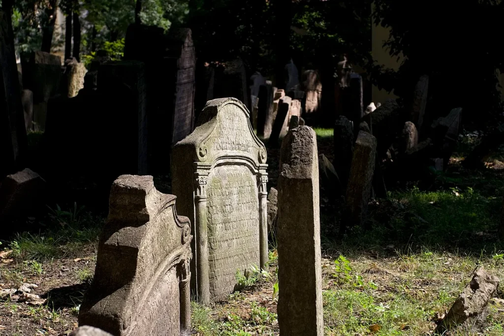 Several old Jewish gravestones in the Prague cemetery.
