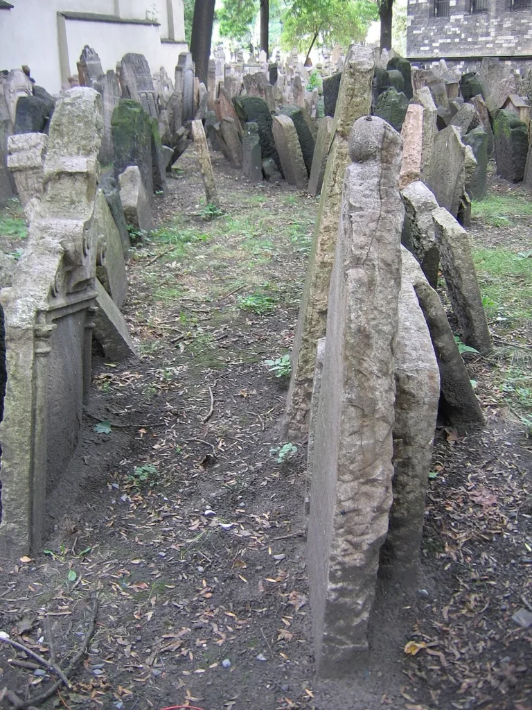 Old Jewish tombstones standing close together in Prague.